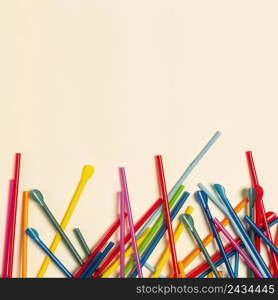 flat lay colorful plastic straw collection
