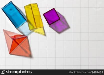 flat lay colorful translucent geometric shapes with copy space