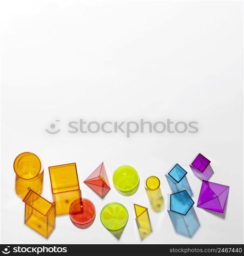 flat lay colorful translucent shapes with copy space