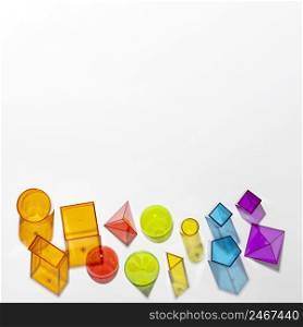 flat lay colorful translucent shapes with copy space