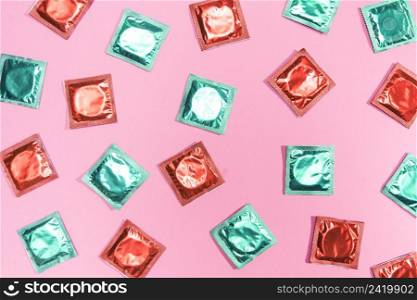 flat lay condoms red green wrappers