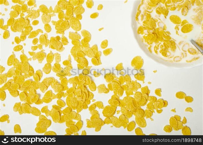 flat lay cornflakes with milk arrangement plain background. Resolution and high quality beautiful photo. flat lay cornflakes with milk arrangement plain background. High quality beautiful photo concept