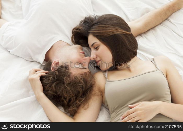 flat lay couple laying bed