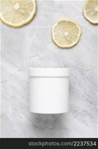 flat lay cream box lemon slices marble background