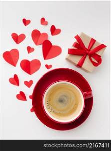flat lay cup coffee with valentines day present