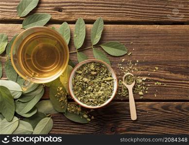 flat lay cup tea natural herbs leaves