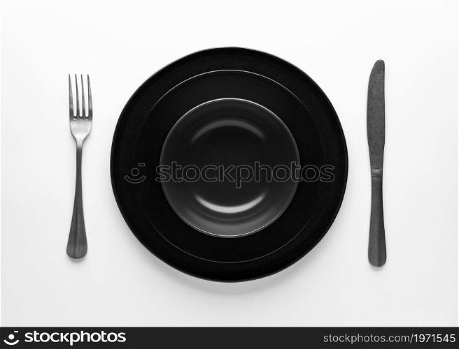 flat lay dark dinnerware cutlery. High resolution photo. flat lay dark dinnerware cutlery. High quality photo