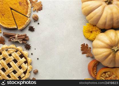 flat lay decoration with pumpkins stucco background