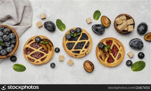 flat lay delicious fruit pies