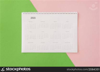 flat lay desk calendar coloured background