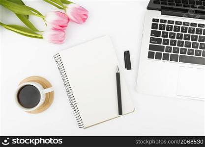 flat lay desk concept with tulips
