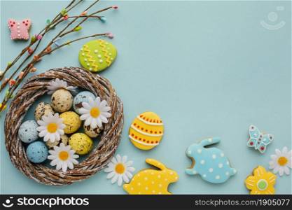 flat lay easter eggs basket with chamomile flowers bunny shape. Beautiful photo. flat lay easter eggs basket with chamomile flowers bunny shape