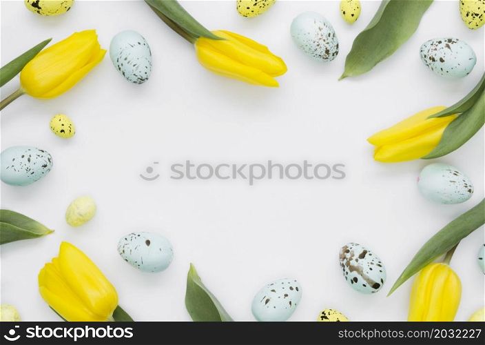 flat lay eggs easter with tulips frame