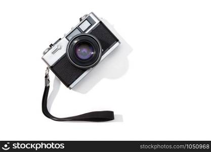 Flat lay film camera isolated on white background. Copy space. Photography or photographer concept