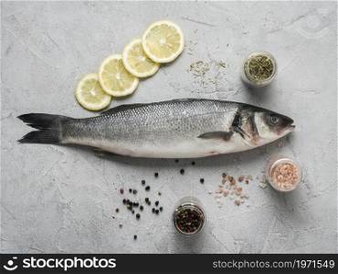 flat lay fish lemon spices. High resolution photo. flat lay fish lemon spices. High quality photo