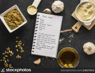 flat lay food ingredients with dough notebook