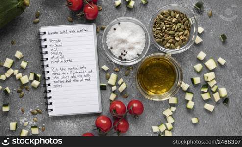 flat lay food ingredients with notebook