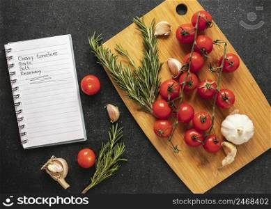 flat lay food ingredients with tomatoes recipe