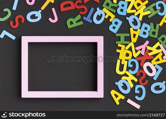 flat lay frame with colorful letters