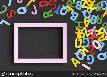 flat lay frame with colorful letters