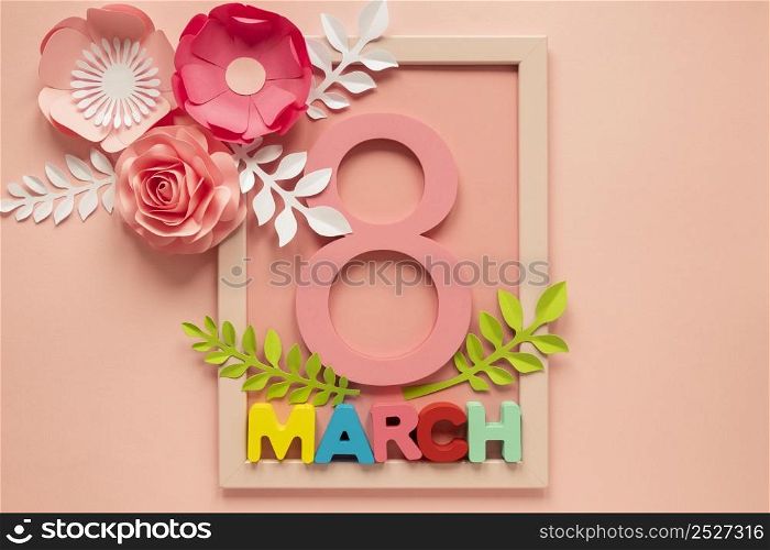 flat lay frame with date paper flowers women s day