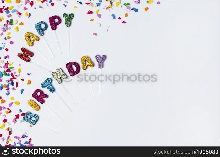 flat lay happy birthday lettering white background with copy space. Beautiful photo. flat lay happy birthday lettering white background with copy space
