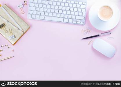 Flat lay home office workspace. Flat lay home office workspace - white modern keyboard on pink background with copy space