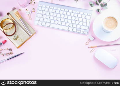Flat lay home office workspace. Flat lay home office workspace - white modern keyboard with female accessories and coffee, copy space on pink background