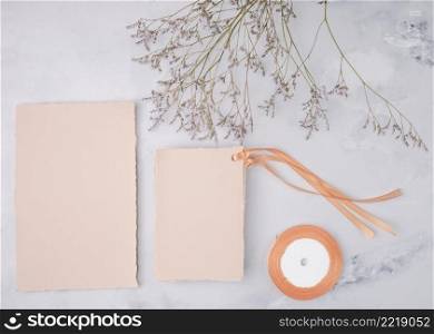 flat lay lovely arrangement with wedding invitations mock up