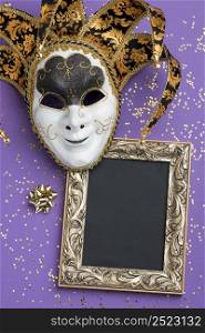 flat lay mask carnival with glitter frame