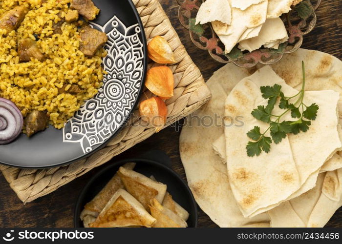 flat lay meal with rice pita