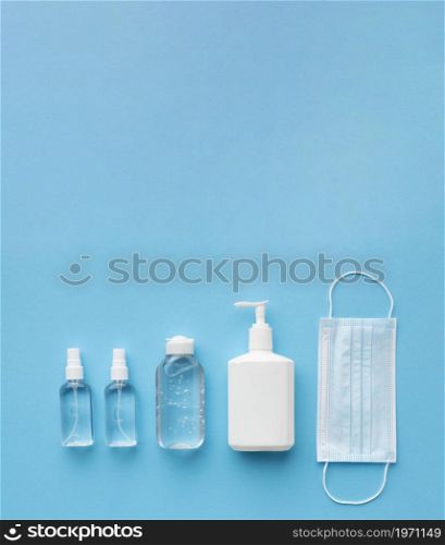 flat lay medical mask with hand sanitizer copy space. High resolution photo. flat lay medical mask with hand sanitizer copy space. High quality photo