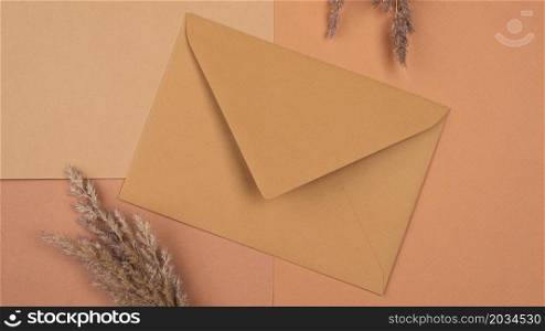 flat lay monochromatic dried lavender envelope