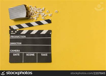 flat lay movie slate with popcorn