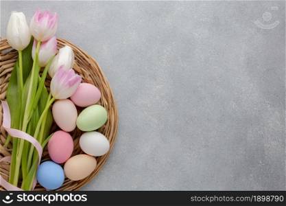 flat lay multicolored tulips with easter eggs copy space. Resolution and high quality beautiful photo. flat lay multicolored tulips with easter eggs copy space. High quality beautiful photo concept