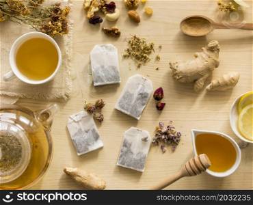 flat lay natural medicinal herbs with tea