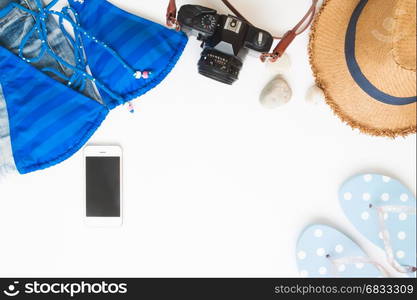 Flat lay of beach items and smart phone, Summer concept on white background