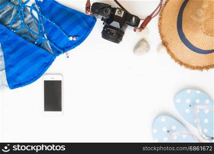 Flat lay of beach items and smart phone, Summer concept on white background