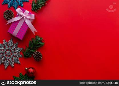 Flat lay of Christmas composition for background on red background. Christmas, winter, new year concept. copy space and soft focus.