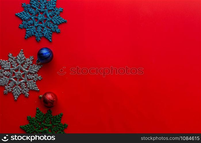 Flat lay of Christmas composition for background on red background. Christmas, winter, new year concept. copy space and soft focus.