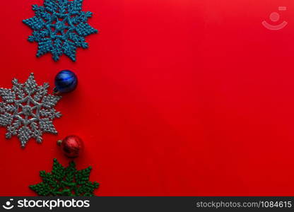 Flat lay of Christmas composition for background on red background. Christmas, winter, new year concept. copy space and soft focus.