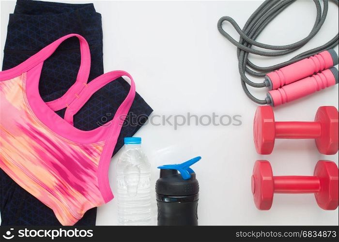 Flat lay of sport clothing and equipments on white background, Healthy and workout concept
