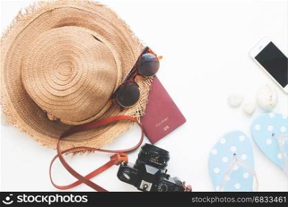 Flat lay of summer items and passport, Travel concept on white background with copy space