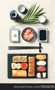 Flat-lay of sushi set on grey concrete background. Flat-lay of sushi set on grey concrete background, flat lay