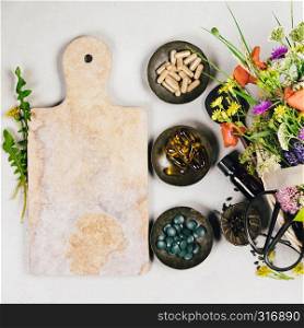 Flat lay of wild healing herbs and flowers. Clean eating, paleo, biohacking, herbal medicine concept. Healthy eating and herbal medicine concept, flat lay, top view