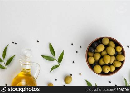 flat lay olives bowl oil bottle. Resolution and high quality beautiful photo. flat lay olives bowl oil bottle. High quality beautiful photo concept