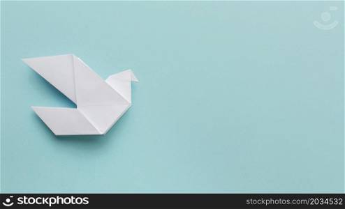 flat lay paper dove with copy space