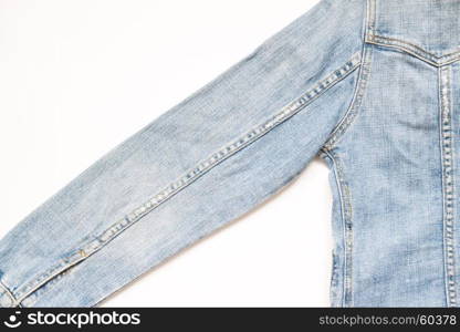 Flat lay part of jeans jacket on white background
