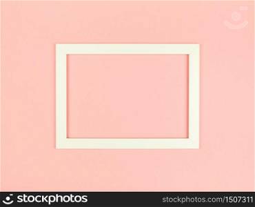 Flat lay pastel colored textured minimalist background with empty picture frame mockup