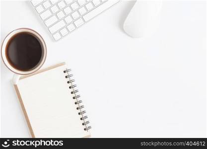 Flat lay photo of office desk with mouse and keyboard,Copy space on white background with coffee,Top view
